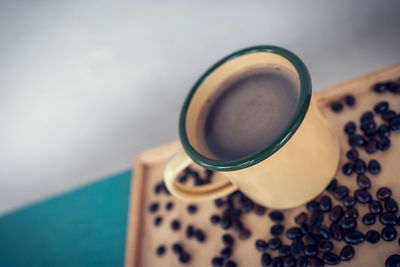 High angle view of coffee cup on table