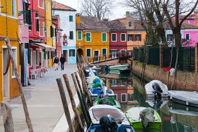 Canal amidst buildings in city