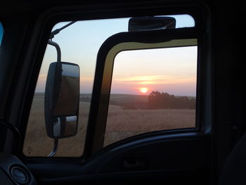 Sunset seen through car window