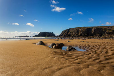 Scenic view of beach against sky