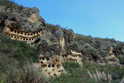 Low angle view of old ruins against clear sky