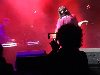 Silhouette of people in nightclub