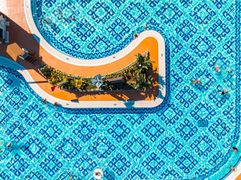 Aerial view of the outdoor swimming pool in a luxury hotel.