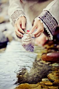 Close-up of hand with water