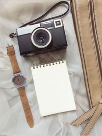 High angle view of camera on table