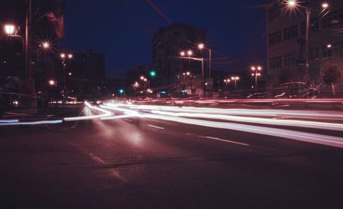 Light trails on city street at night