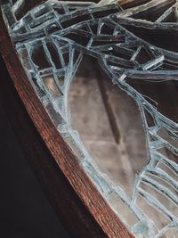 High angle view of icicles on glass window