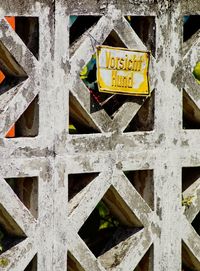 Detail shot of text on fence