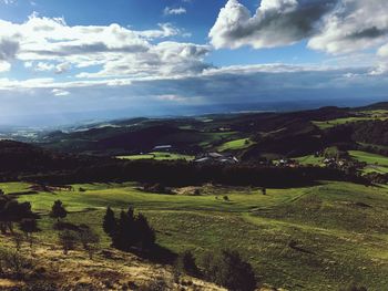 Scenic view of landscape against cloudy sky seen from wasserkuppe