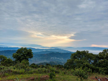 Scenic view of landscape against sky during sunset