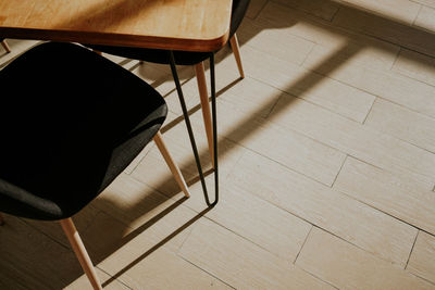 High angle view of chair on table at home