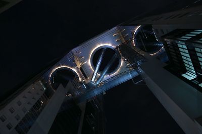 Low angle view of illuminated light at night