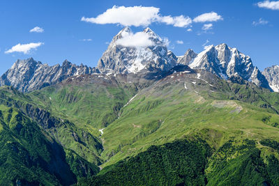 Scenic view of caucasus mountain range with mount ushba.