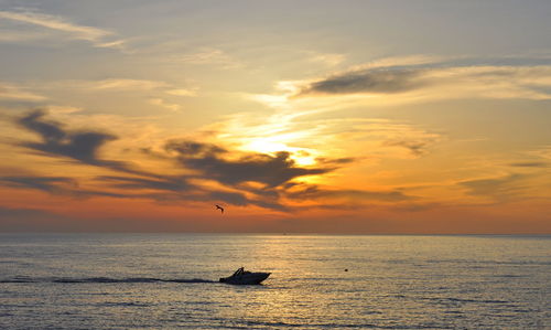 View of calm sea at sunset