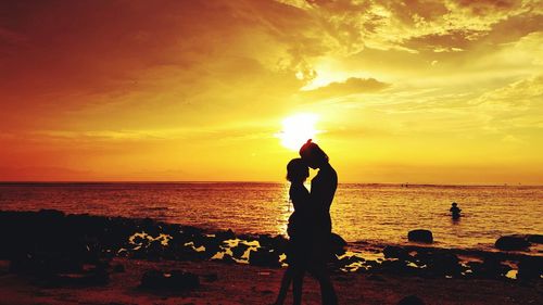 Scenic view of sea at sunset