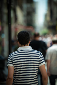 Rear view of man standing outdoors