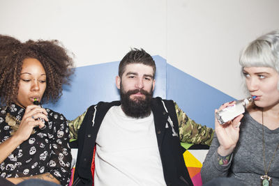 Young friends smoking