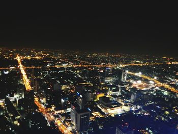 Illuminated cityscape at night