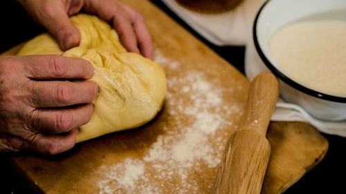 Cropped hand holding food