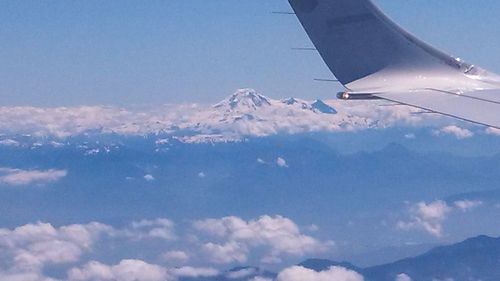 Aerial view of landscape with mountains in background