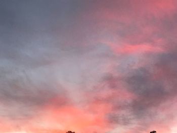 Low angle view of dramatic sky during sunset