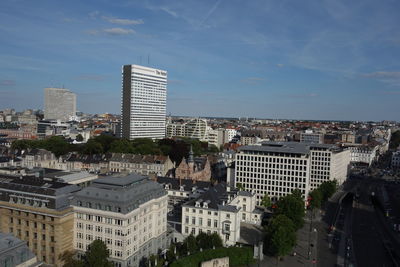 High angle view of buildings in city against sky