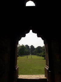 Archway of historic building against sky
