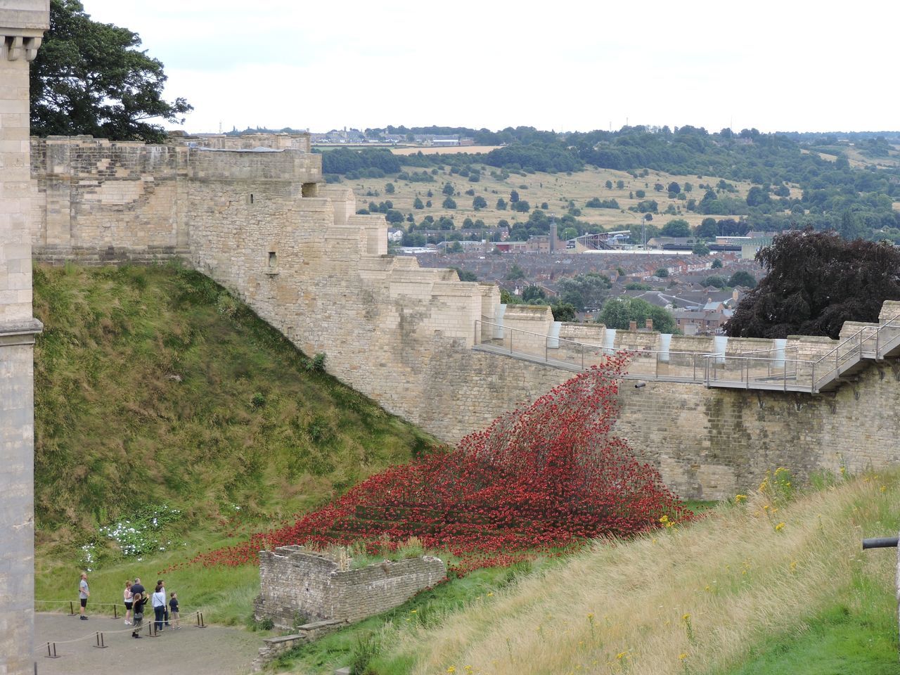 architecture, built structure, history, famous place, ancient, travel destinations, tourism, ancient civilization, old ruin, the past, international landmark, tourist, grass, archaeology, leisure activity, landscape, sky, lifestyles, day, vacations, cultures, stone material, castle, outdoors, capital cities