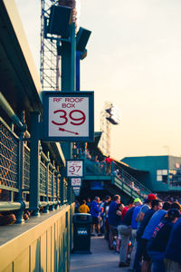 People in city against sky