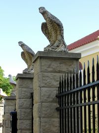 Low angle view of statue against clear sky