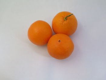 High angle view of orange on white background