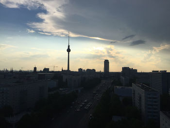 Cityscape against sky during sunset