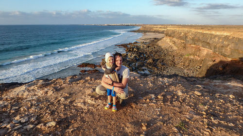 Father with daughter at beach