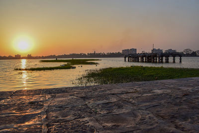 Scenic view of sea against sky during sunset