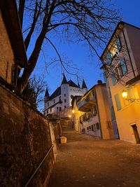 Low angle view of illuminated buildings at night