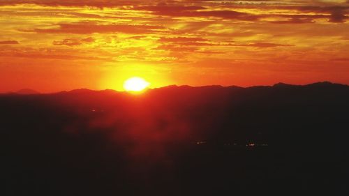 Sun shining through clouds