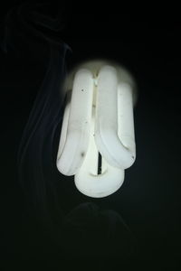 Close-up of illuminated light bulb