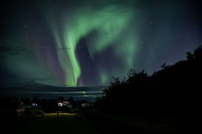 Aurora borealis, also known as northern lights, at skaftafell nationalpark campsite, iceland.