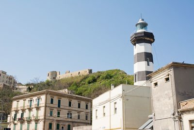 Low angle view of building against clear blue sky