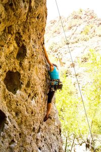 Full length of people on rock formation