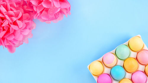 Directly above shot of pills against blue background