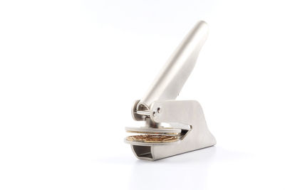 Close-up of electric lamp against white background