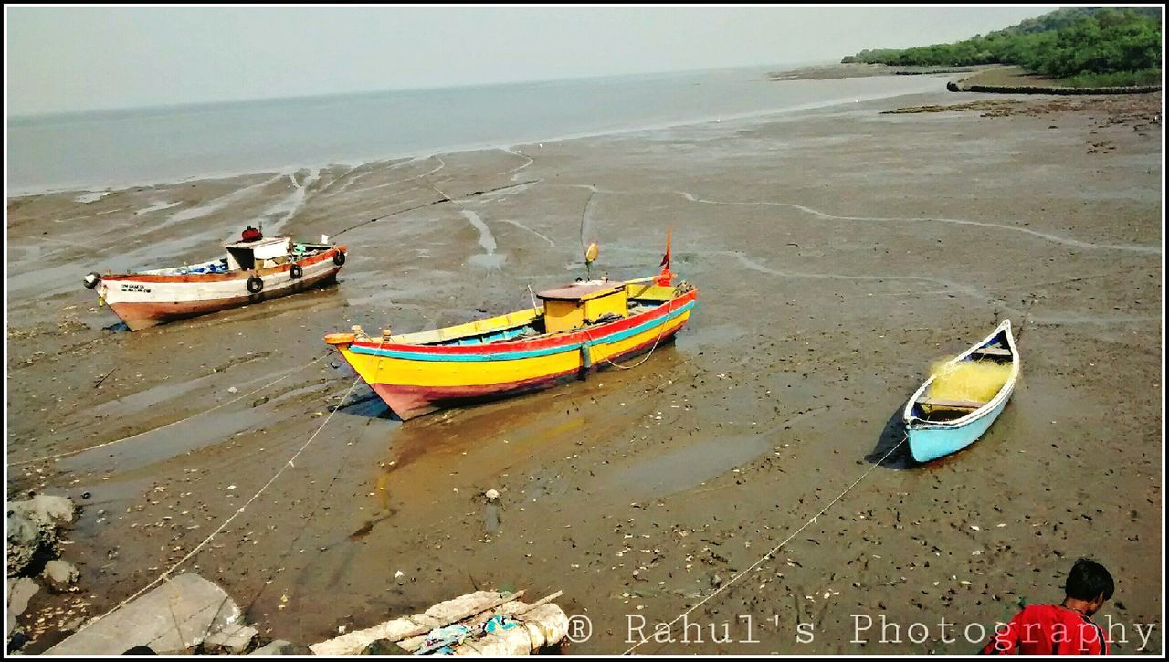 VIEW OF BOATS IN SEA
