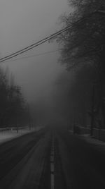 Empty road against sky