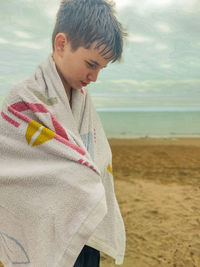 Full length of boy on beach