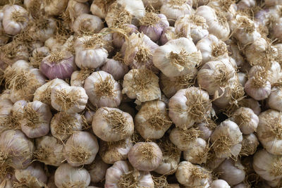 Full frame shot of onions for sale in market