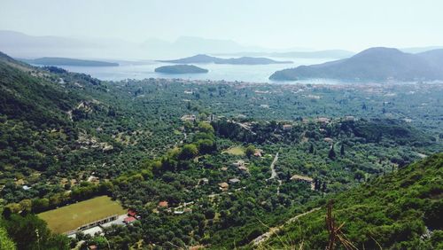 High angle view of landscape and mountains against sky