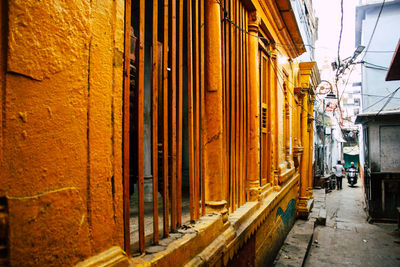 Narrow street amidst buildings in town