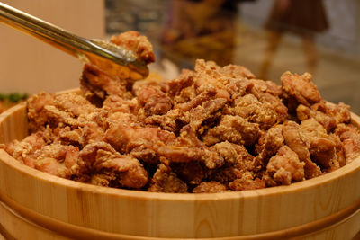 Close-up of bread in container on table