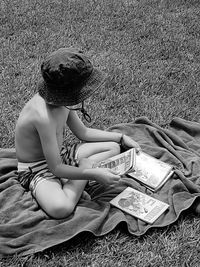 Girl sitting on field